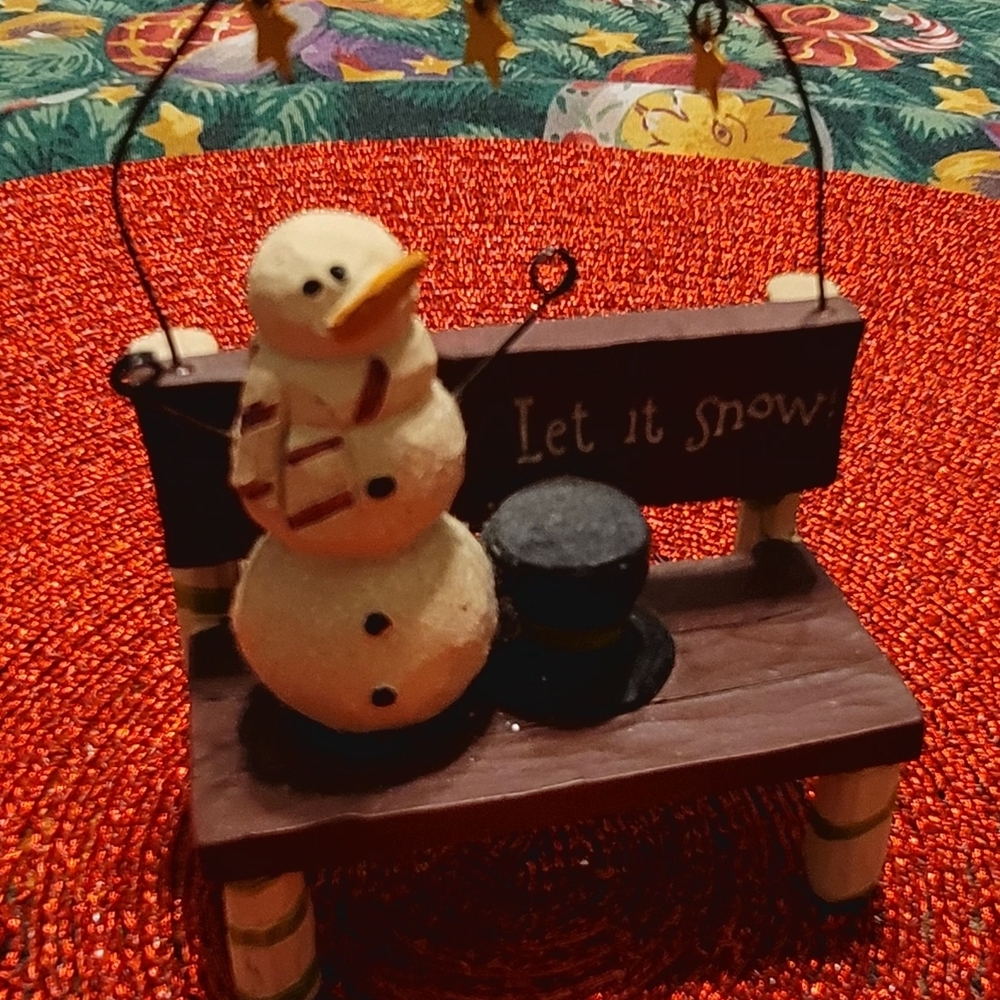 Snowman Figurine on Bench